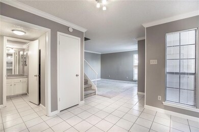 Half Bath and utility Area to the left