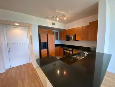 Beautiful open kitchen with plenty of closet space.
