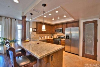 Kitchen with Pantry, Granite, Coved Ceiling, and S