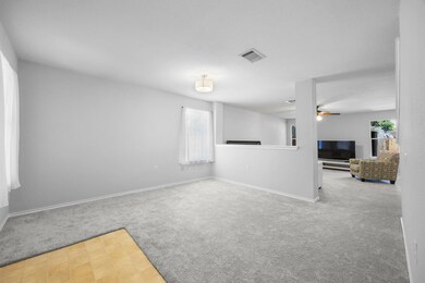 Unfurnished living room featuring plenty of natur