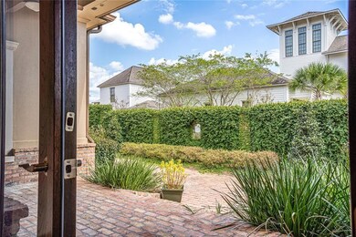 Enter brick courtyard from living room, just off t