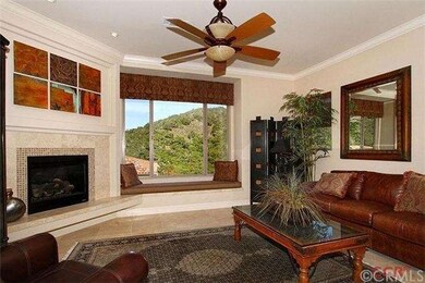 Living area with fireplace and large view window