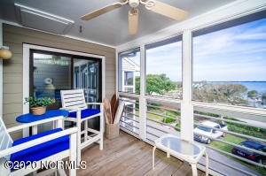 Screened porch w/ marina views