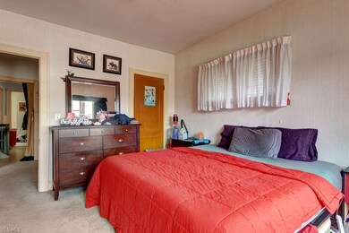 Downstairs unit bedroom number one looking towards the closet.