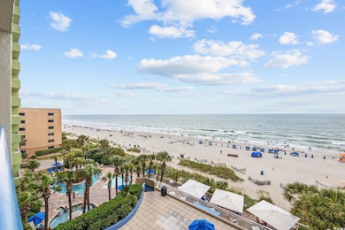 Property view of water featuring a beach view