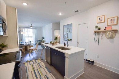 Kitchen with sink, dark hardwood / wood-style floo