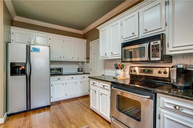 The kitchen has crown molding, additional counter and cabinet space, not to mention an extended walk-in pantry with hardwoods, shown in the virtual tour.