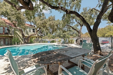 View of swimming pool featuring a fenced backyard