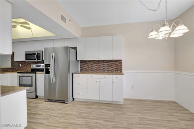 Kitchen with appliances with stainless steel finis