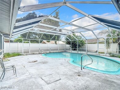 View of pool with a patio and a lanai