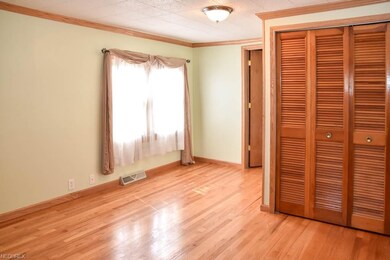 First floor master suite with a private full bath.