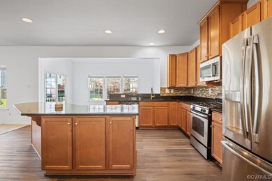 Open layout, eat-in kitchen with view into Florida