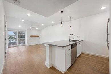 Kitchen featuring a sink, stainless steel dishwas