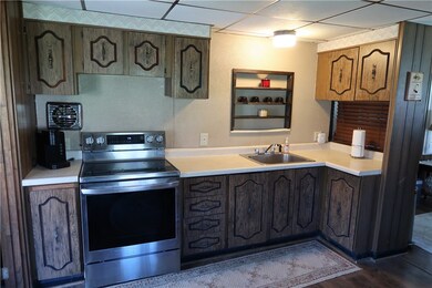 Equipped, space-saver kitchen with stainless steel