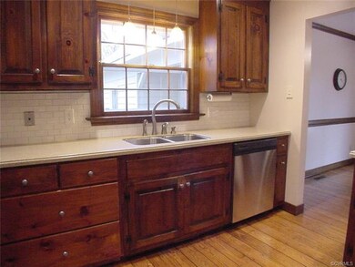 Kitchen has nice set of drawers and subway tile ba