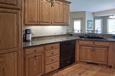 Kitchen with granite counters, under counter light