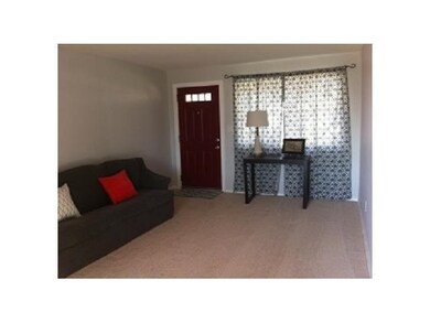 Living Room. Brand new carpet throughout!