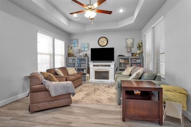 Living room with recessed ceiling feature