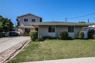 Expanded 2 story home with room for RV parking.