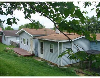 Exterior Back. Nice patio off LR and add. room to 