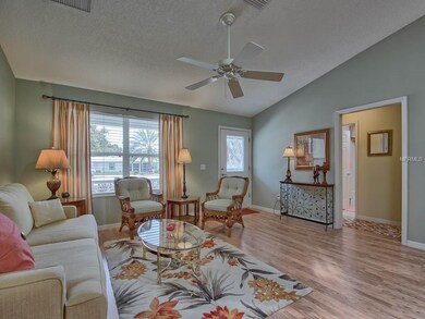 Leaded glass front door leads to open floor plan w