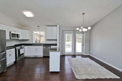 Kitchen and dining area.  The center island is on 