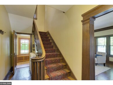 The foyer opens to the living room, dining room an