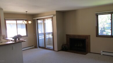 Fireplace and door to Balcony