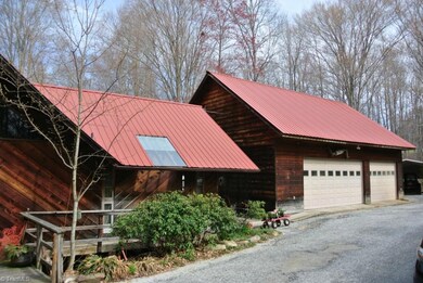 FRONT VIEW OF THE HOUSE AND 3 CAR GARAGE