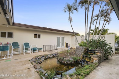 1132 Pine Tree Dr, Satellite Beach, FL 32937 - photo 4