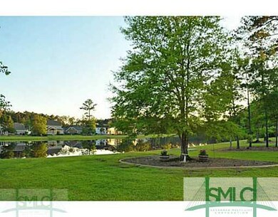 Exterior Back. Lagoon view and mature trees.  Fore