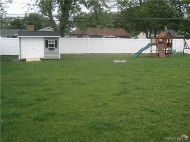 Yard. Brand New Shed, Firepit and Playset.