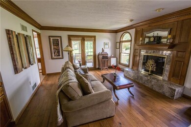 Cozy family room with marble fireplace.
