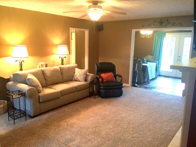 You'll love this living room right off of kitchen and backyard.