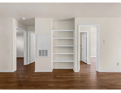 Unfurnished bedroom featuring visible vents, base