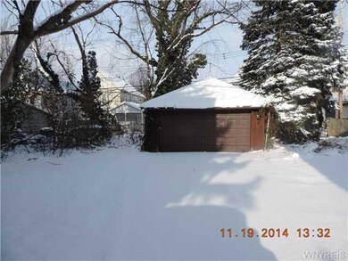 Backyard. The back yard and garage area.