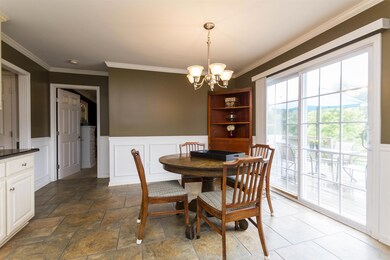 Tile Floors, Crown Molding and Wainscot below chair railing 