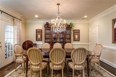 Dining room is on the left at entry.  Chandelier d