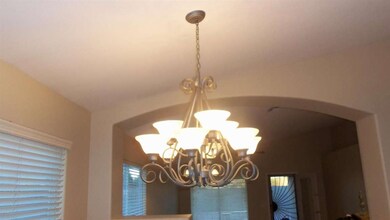 LIGHT FIXTURE IN DINING ROOM