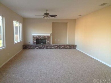 large family room with fireplace.