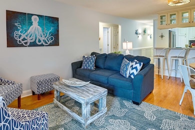 Living area featuring wood finished floors