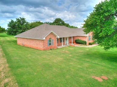 Ranch-style house with a front lawn