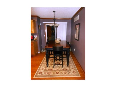 Dining Area with todays paint colors & hardwood fl