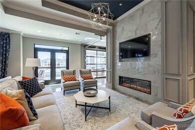 Living room featuring crown molding, french doors,