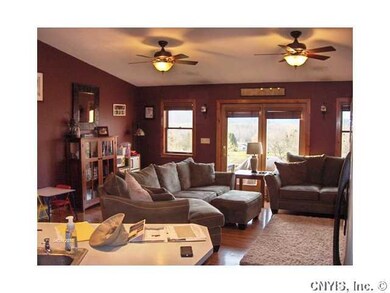 Living Room. Living room.  Note the twin ceiling l