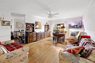 Living room featuring ornamental molding, ceiling