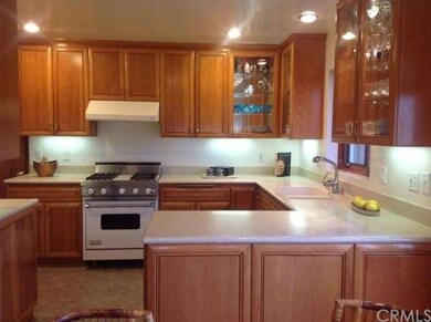 Remodeled kitchen with maple cabinets