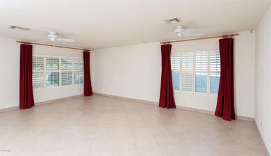living room with formal dining area