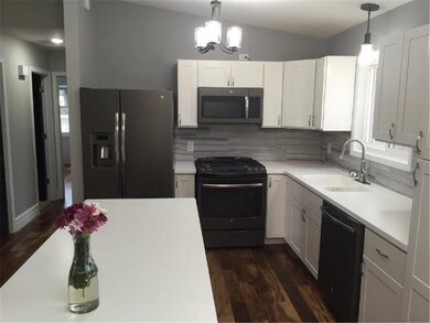 Another view of the kitchen with large island