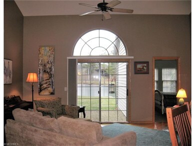 23' x 18' Vaulted Great room overlooking water.